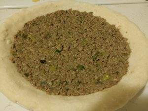 pie with filling before baking