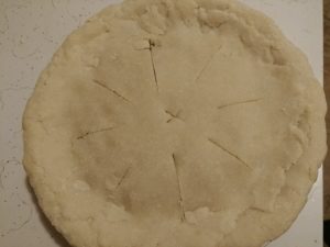 pie with top crust before baking
